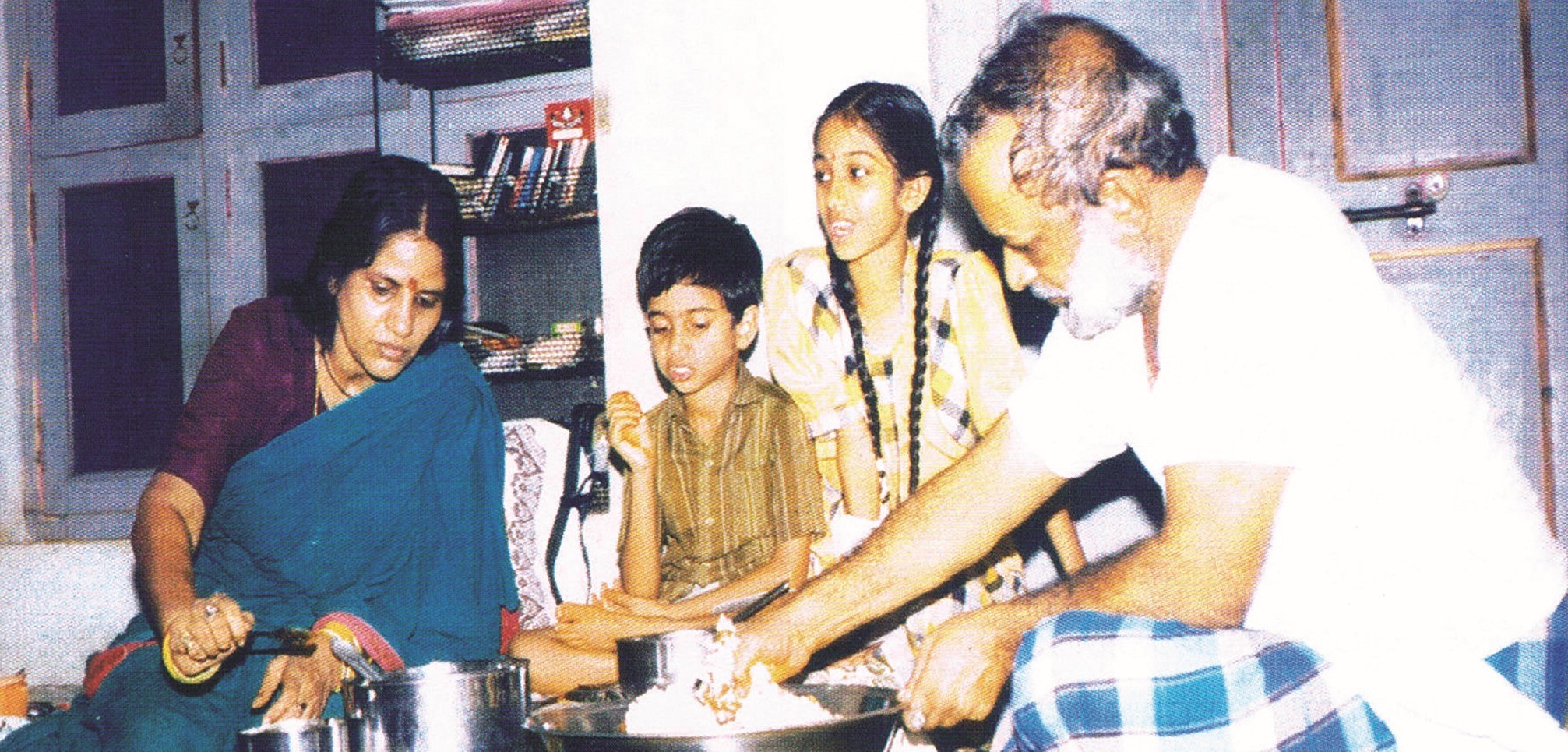 Volunteers helping children in education program